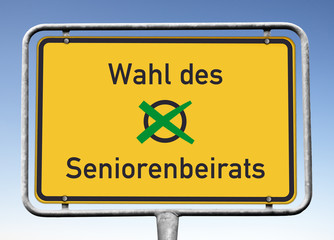 Schild mit einem grünen Kreuz, Wahl des Seniorenbeirats,