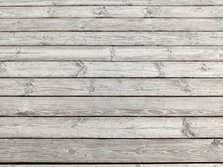 Dark dilapidated cracked boards. Wood old table. Rustic timber texture. Weathered oak planks. Interior decoration. Natural wooden background, pattern.