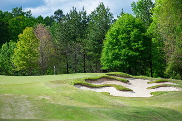 A challenging golf course with a pin