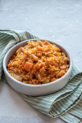 Vegetarian fried rice with cabbage, carrots and tomato