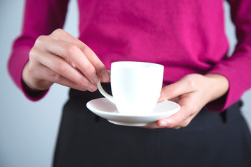 woman hand cup of coffee