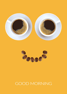 Naklejki poster with smiling face with two cups of coffee