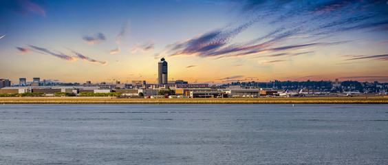 Boston's Logain Airport from across the harbor - obrazy, fototapety, plakaty