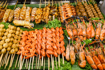 Beautiful fish products barbeque on market grill