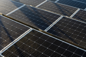 Solar panels on the roof of a building in detail.