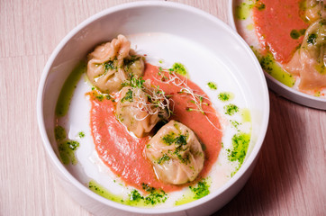 Delicious Jiaozi served with a sweet sauce