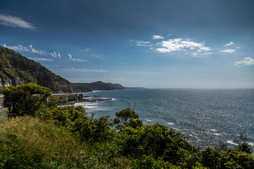 Traveling along the Great Ocean Road in New South Wales, Australia at a sunny day in summer. View on a bridge.