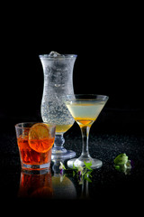alcoholic cocktails on a black background