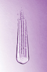 Transparent gel with bubbles close-up. Smear of face gel cream. The texture of gel cream. A sample of a cosmetic product. Antibacterial gel.