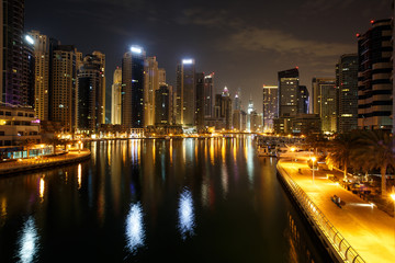 Highrise buildings at Dubai Marina illuminated at night