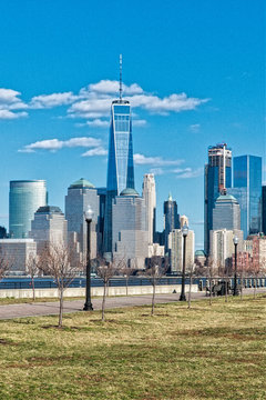 View Of Manhattan Skyline, From Liberty State Park In Jersey City, New Jersey. Manhattan Is The Most Densely Populated Of The Five Boroughs Of New York City.