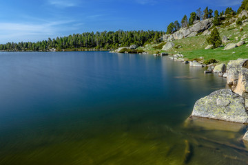 Beautiful lake in the mountains - Estany de Malniu (Catalan Pyrenees, Spain)