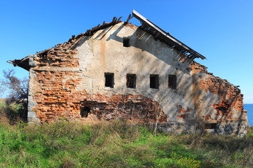 An old ruined house in a Bulgarian village near the sea.