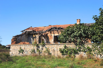 An old ruined house in a Bulgarian village near the sea.