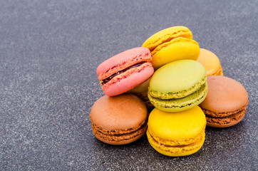 Multicolored almond french macaroons. Studio Photo