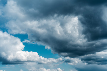 Obraz premium Dramatic sky with stormy clouds. The combination of light and dark clouds. Color trends.