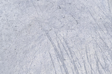 Gray abstract concrete wall background. Photo of a cement texture with scratches. For layouts or sites.