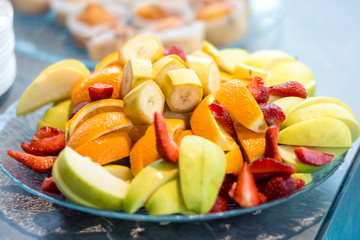 Summer gifts, fruit platter on a dish. Horizontal frame