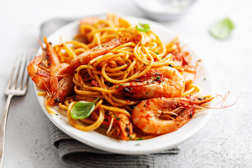 Pasta spaghetti with tomato sauce and shrimps