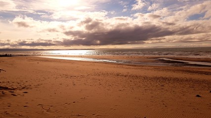 Fototapeta na wymiar Sunset photos at beachfront/oceans edge/ island silhouettes