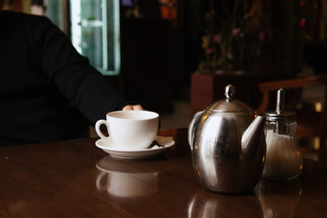 teapot and cup on the table