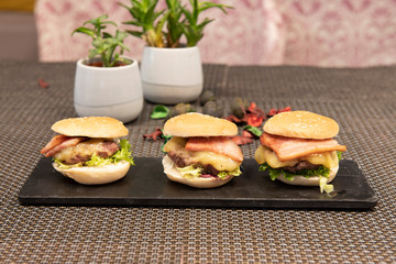 mini burgers on chalkboard