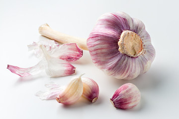 Garlic bulb and garlic cloves isolated on white background