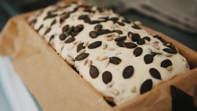 Homemade bread with pumpking seed on the kitchen counter. Close up
