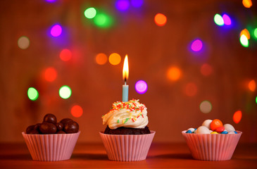 cupcake with a candle.