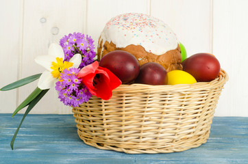 Delicious Easter cake, colored eggs for Easter celebration.