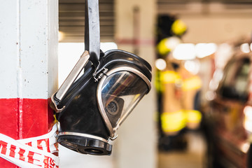 Gas mask of firefighters to protect themselves, hanging from the wall.