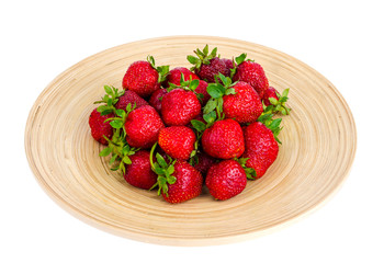 Ripe sweet farmer red strawberries on wooden dish