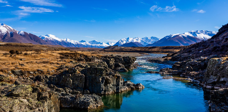 The Ahuriri River and Mountain Range on a Vibrant Spring Day in New Zealand