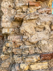 Fragment of an old brick wall. Background, brick texture