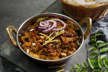 Lachha Paratha or Indian layered Roti with Pork Fry, selective focus