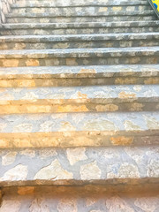 Steps of stone stairs, bottom to top view.