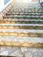 Steps of stone stairs, bottom to top view.
