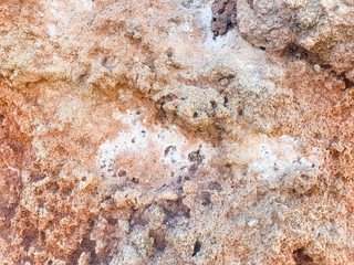 Background, texture of natural stone of pink shade.