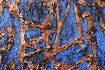 blue spots and gold relief lines. abstract background. peeling paint.
