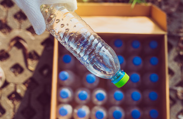 Volunteer woman holding plastic bottle at public park,Dispose recycle and waste management concept,Good conscious mind