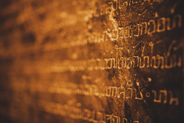 Closeup of Thai ancient stone inscription at Sukhothai province