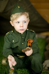 boy in uniform. on the holiday of May 9, Russia