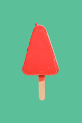 red chocolate outer popsicle on green background