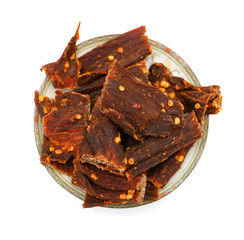 top view spicy beef jerky on white background