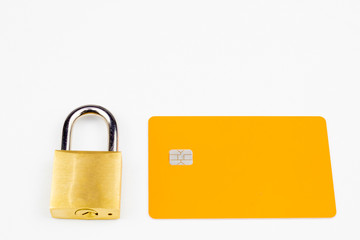 padlock next to an orange credit card