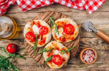 Pizzete. Home baked mini pizzas bolognese. Tomato sauce ,mozzarella cheese and minced meat. Rustic...