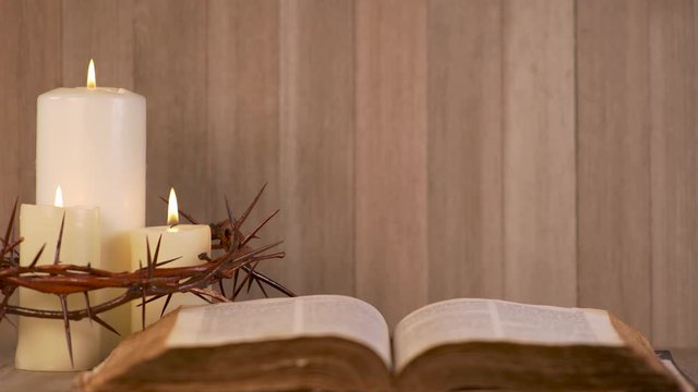 Open Bible and Candles Surrounded by Crown of Thorns. Communion