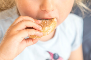 girl eating biscuit