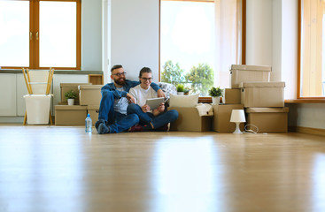 Young couple moving in to new home together