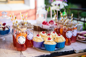 Party and festive table with delicious pastries and drinks